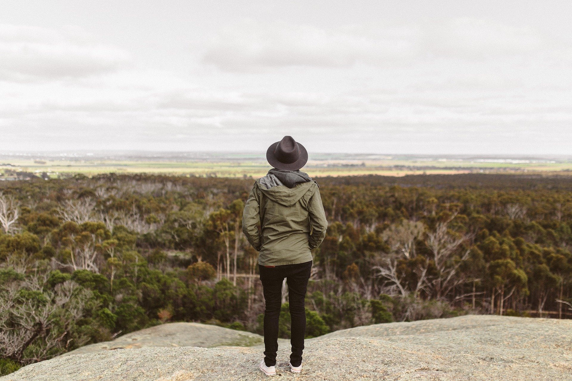 Woman Looking Over Mountains